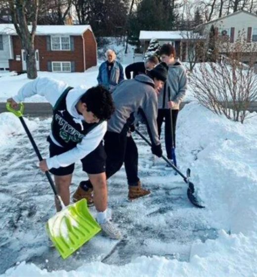 Football Coach Instructs Players To Shovel Snow For Neighbors